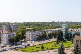 город