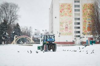 город