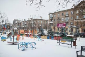 город