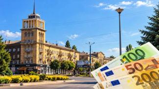 город