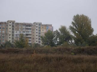 город