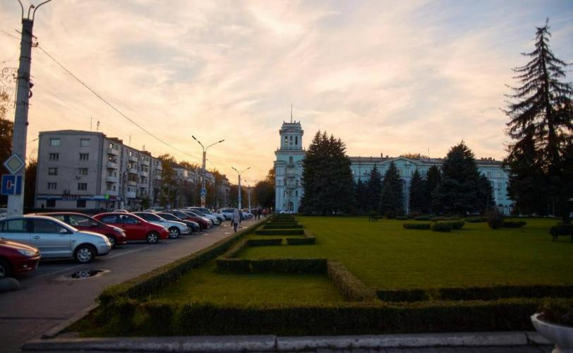 город