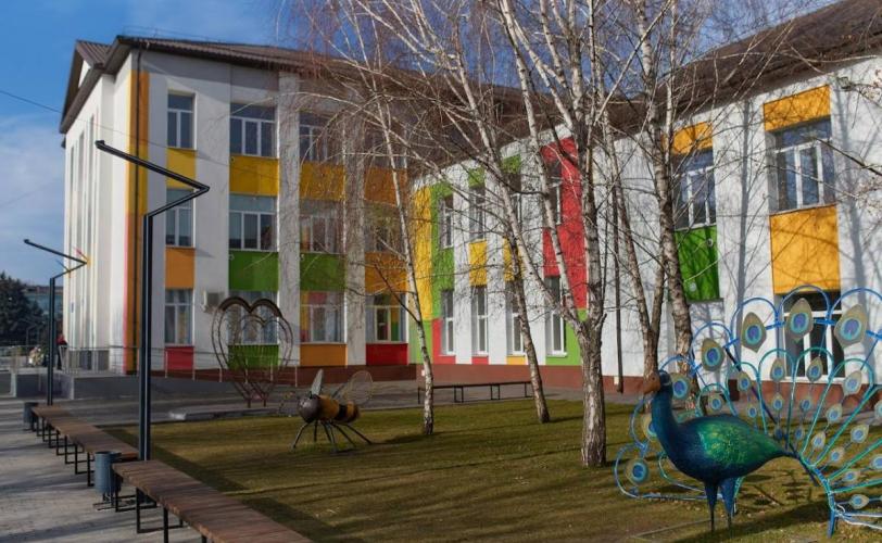 город