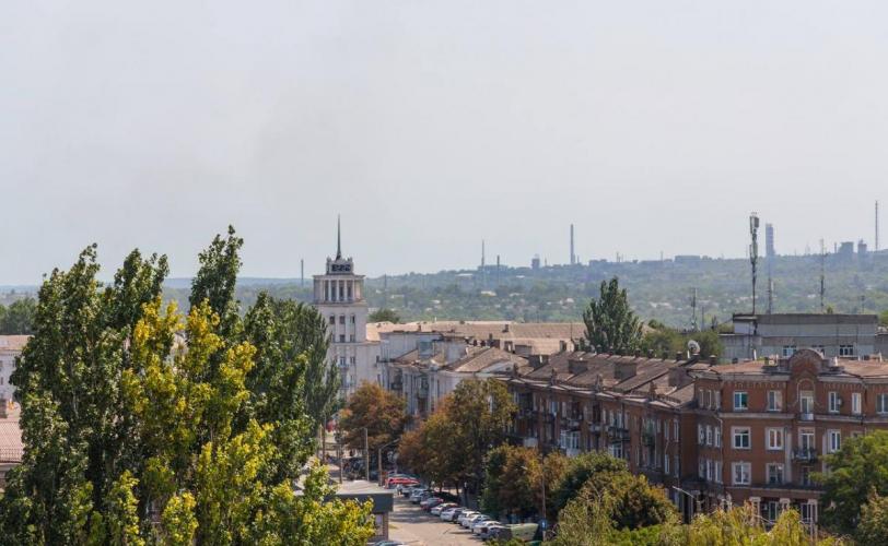 город