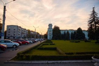 город
