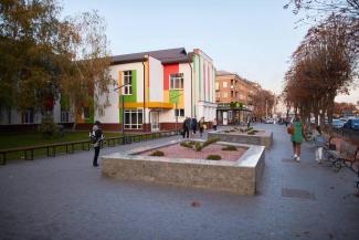 город
