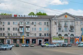 город