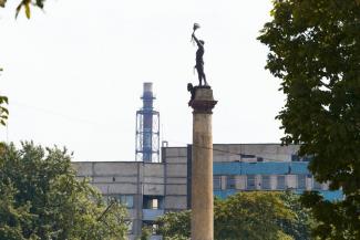 город