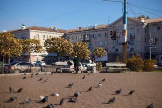 город