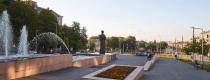 город