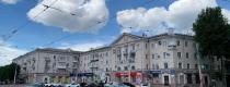 город