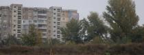 город
